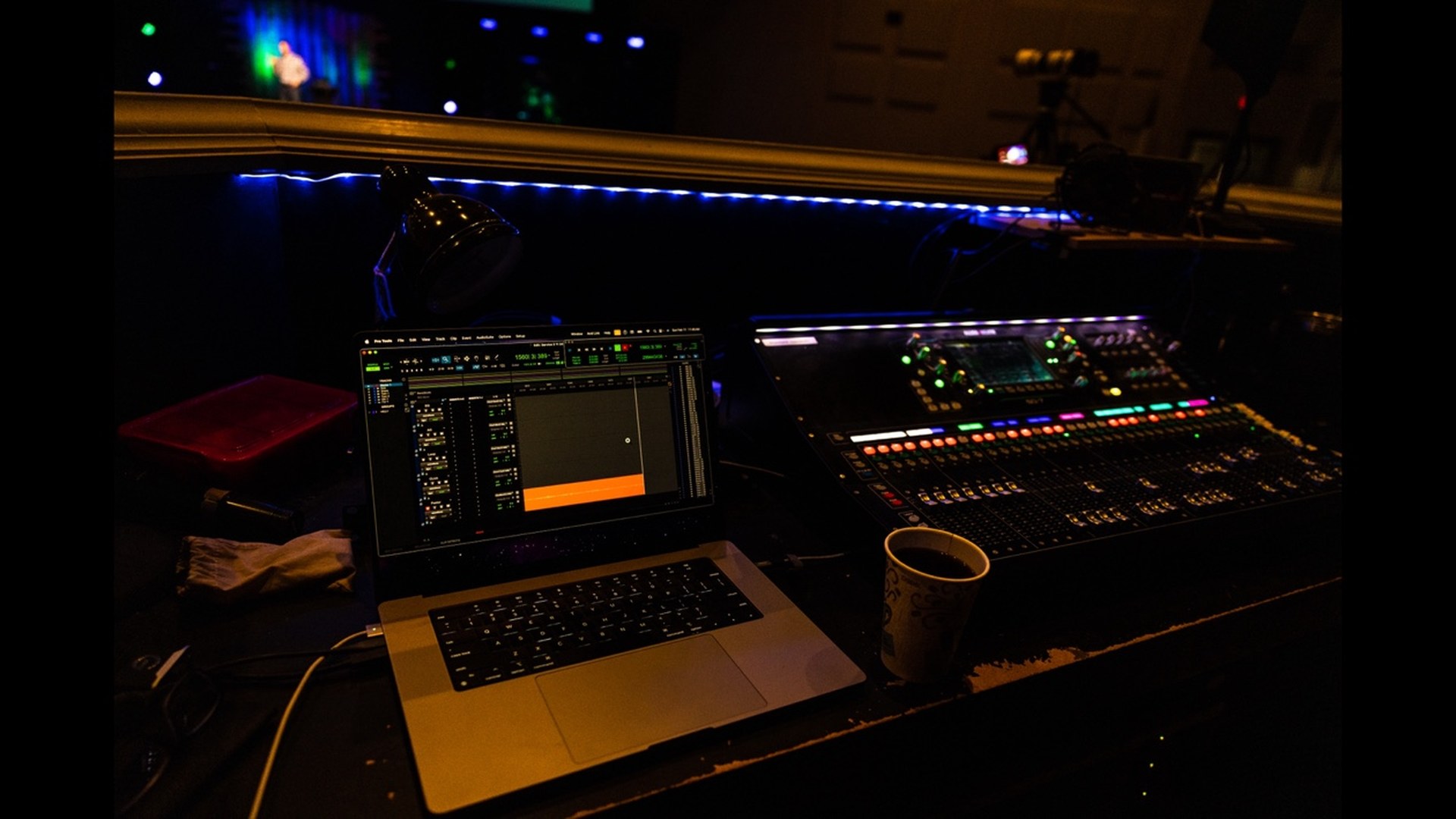 Digital mixing console and MacBook used for multitrack recording